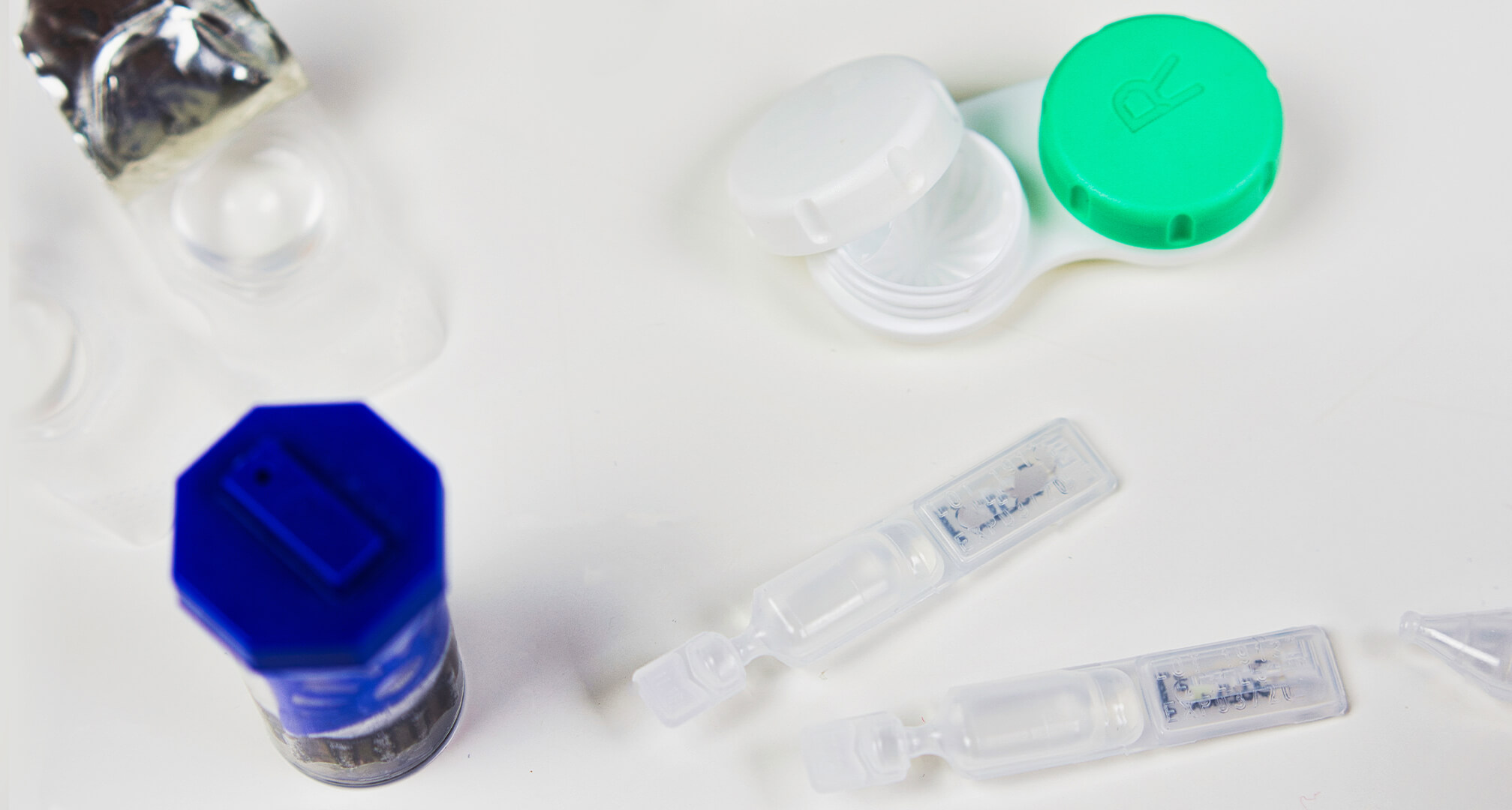 contact lens cases for peroxide and multi-purpose solutions